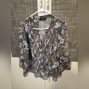 Pretty gray flowered blouse, a bit shear. Pleated front.